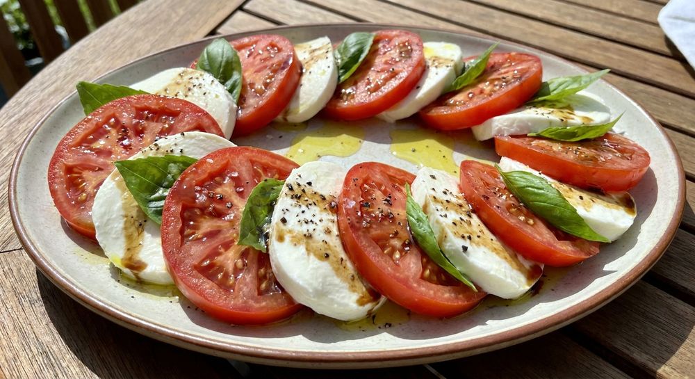 Caprese salad with mozzarella, tomato and basil